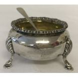A 3 footed silver salt with scallop shell detail to top of legs. Hallmarked Chester, 1940.