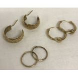 3 pairs of 9ct gold hoop style earrings.
