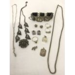 A collection of vintage silver and white metal jewellery.