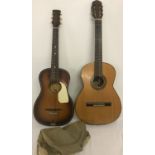 2 vintage wooden bodied, 6 string guitars, one full sized.