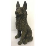 A large brass ornament of dog.