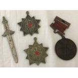 4 Chinese metal badges/medals.