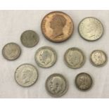 A collection of antique and vintage coins.