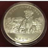 A 1994 Isle of Man D-Day commemorative crown. In clear protective case.