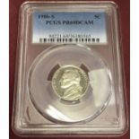 A 1986-S cased Jefferson US five cent coin. In plastic case PCGS PR69DCAM.