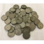 A tray of 54 florin coins. Sovereign heads include George V, George VI and Elizabeth II.