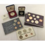 5 cased coins and coin sets.