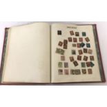 A vintage "Errimar" stamp album containing British world stamps including an 1840 Penny Black.