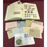 An "Acme" stamp album containing vintage world stamps.