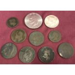 A small collection of antique vintage foreign coins.