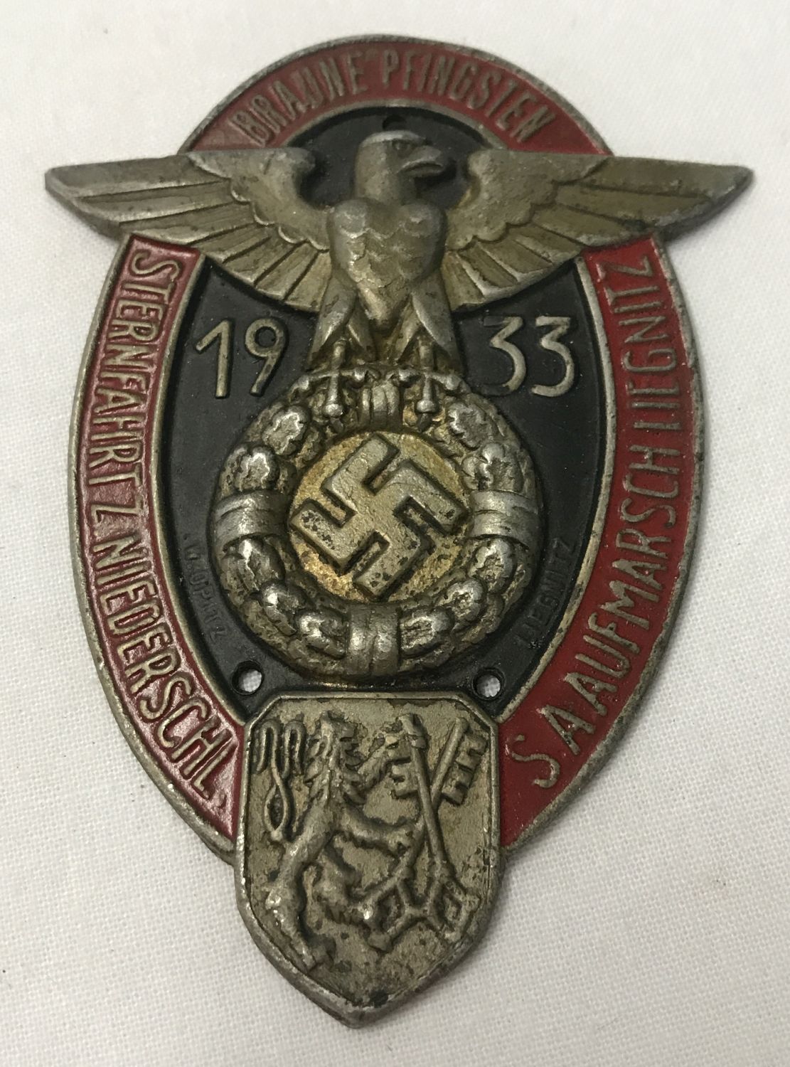 A German WWII style 1933 SA Rally plaque.