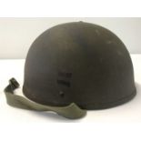 A Belgian steel Tanker helmet, copied from a British design, with hand drawn decals.