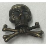 A German Brunswick skull cap badge with slider fixings to reverse.