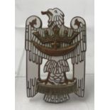A WWII style German Silesian Eagle badge with white enamelling, no pin.