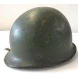 A WWII, US made, Spanish MIC Paratroop helmet with front join.