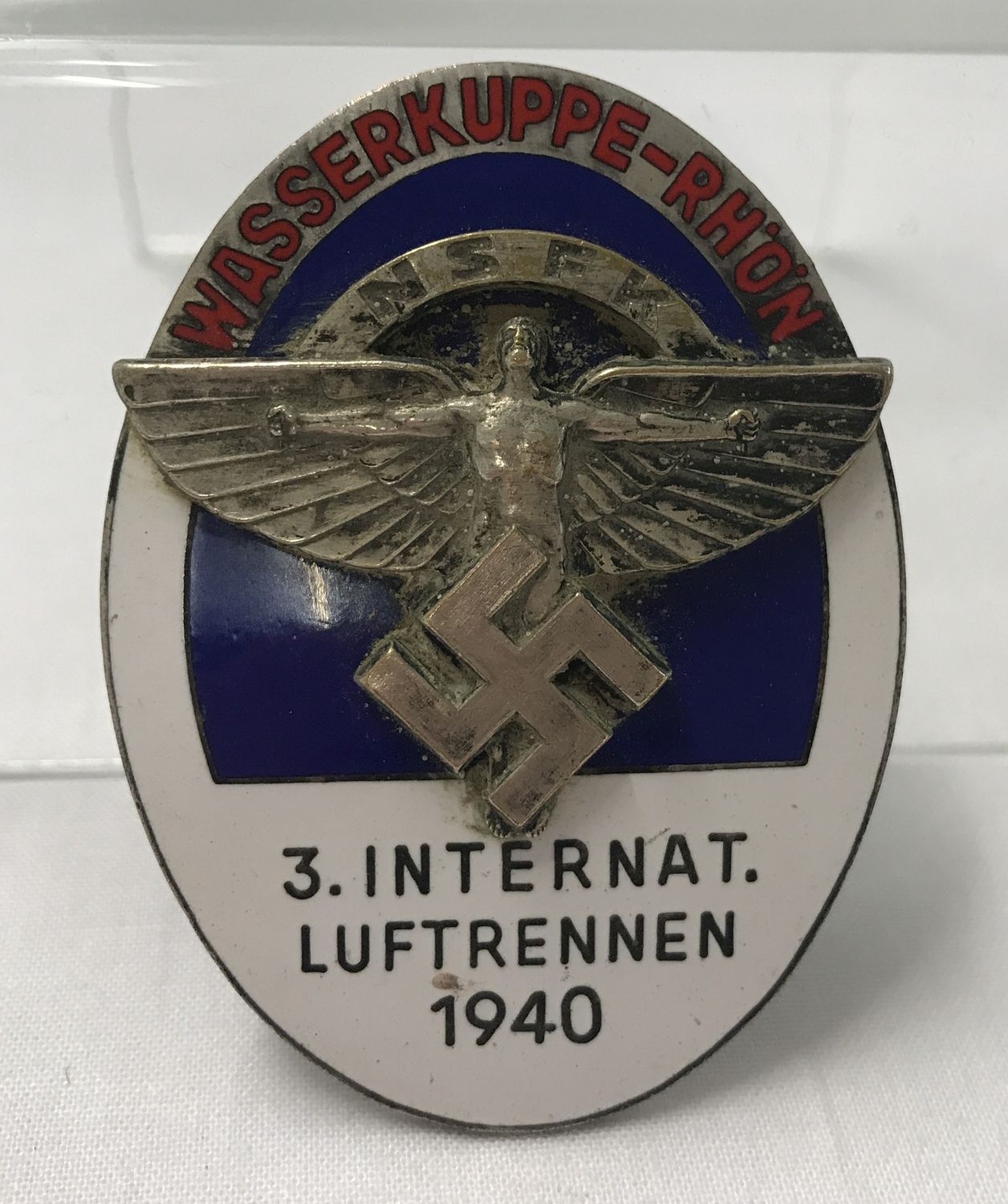 A German WWII style N.S.F.K (The National Socialist Flyers Corps) enamelled competition badge.