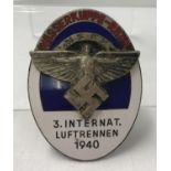 A German WWII style N.S.F.K (The National Socialist Flyers Corps) enamelled competition badge.