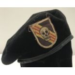 A Vietnam War style US "Bright Light", Special Forces P.O.W Recovery Team beret with badge.