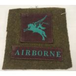 WWII style British Paratroopers patches on uniform fragment.