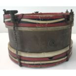 A vintage Henry Potter & Co, London, brass and wood military band snare drum.