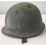 A circa 1991 Gulf War Iraqi helmet with canvas interior suspension lining.