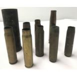 10 x WWI, WWII and post-war small shell and bullet cases; inert.