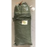 A kahaki green 2 man tent in carry bag.