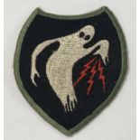 A WWII style US 23rd HQ Special Troops (Ghost Army) cloth patch.