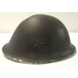 A British WWII style Commando's 44 pattern D-Day turtle helmet.