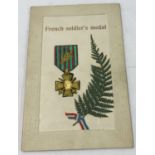 A WWI embroidered silk postcard - French Soldier's Medal.