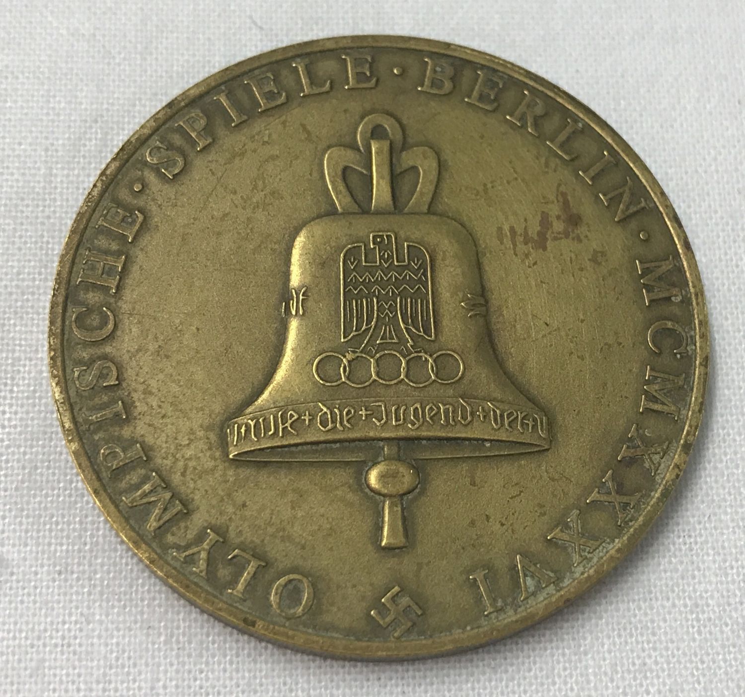 A German WWII style 1936 Berlin Olympics medallion.