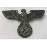 A German WWII style SA Kepi eagle badge with 2 slider fixings on reverse.