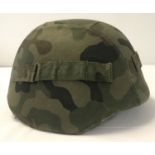 A Polish prototype Kevlar helmet M93, with canvas cover.