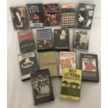 A collection of 15 vintage mixed genre music cassettes.