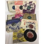 7 vintage 78" records together with 5 vintage 45 singles.