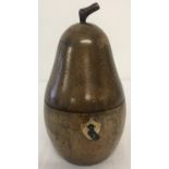 A Georgian style fruitwood tea caddy in the shape of a pear, complete with key.