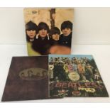 3 vintage Beatles vinyl LP's.