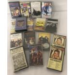A small collection of vintage cased tapes.
