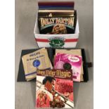 A box of LP box sets and 1950's 78 records.