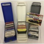 3 vintage plastic carry cases containing 32 assorted cassette tapes.