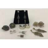 8 pairs of silver and white metal earrings. To include stud, drop and clip on style; some stone set.