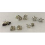 5 pairs of silver stud style earrings.