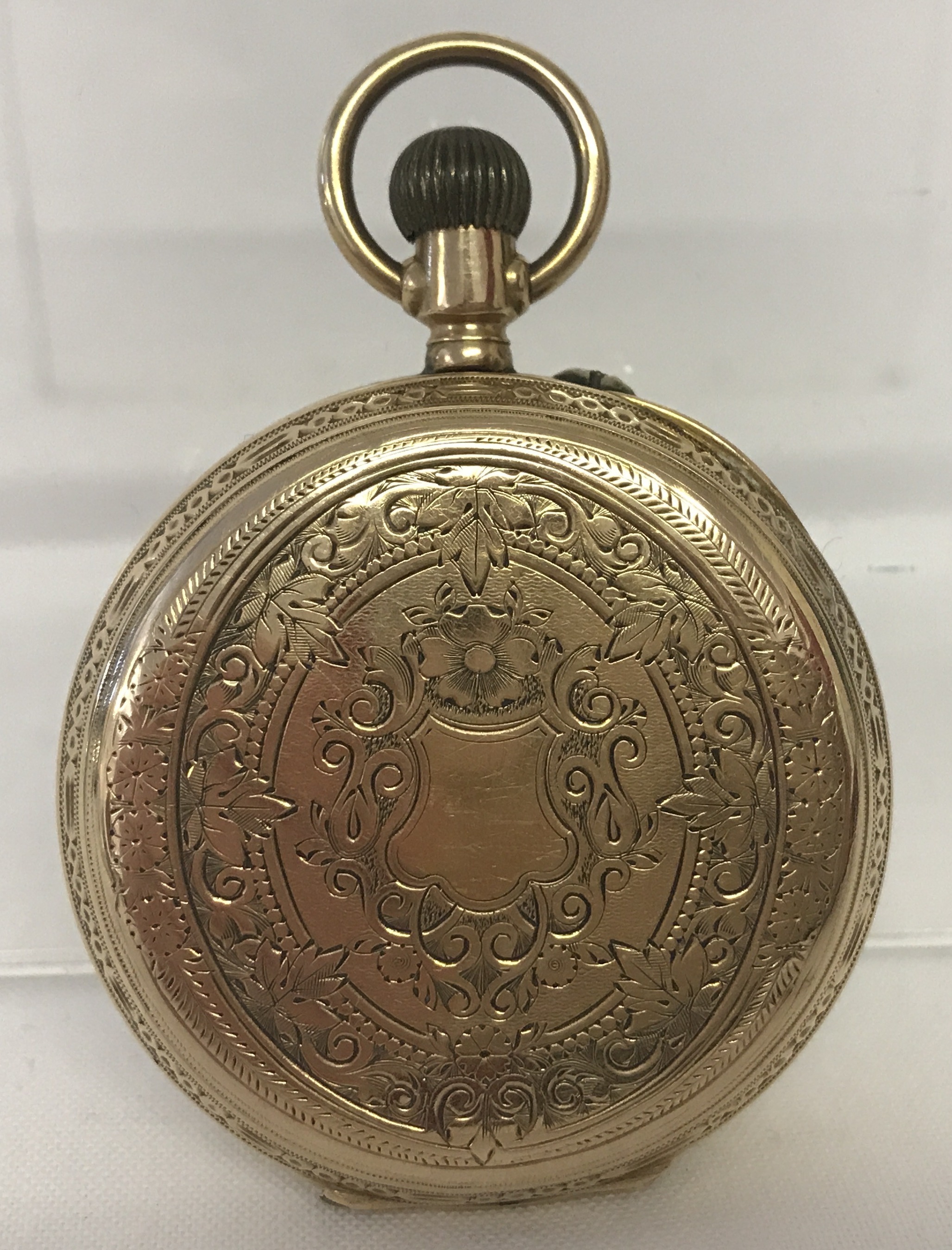 A ladies French 9ct gold case pocket watch. Full engraved decoration and empty cartouche to back. - Image 2 of 2