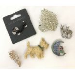 5 stone set animal brooches together with a vintage plastic Highland Terrier brooch.