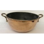 A very large Victorian copper and brass dome based candy pan with riveted handles.