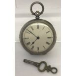 A French vintage ladies silver pocket watch complete with watch key. Engraved decoration to back