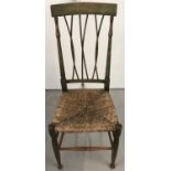 A rush seated high back hall chair with bentwood style twisted spindles and turned detail.