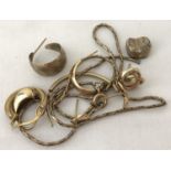 A bag of scrap 9ct gold broken jewellery. Some items contain stones.