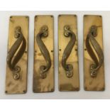 A set of 4 early 20th century Russell and Erwin brass door handles.