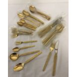 A set of continental gold plated cutlery by Webber & Hill.